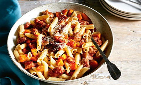 Curtis Stone’s Penne pasta with pan-roasted butternut pumpkin and pork sausages