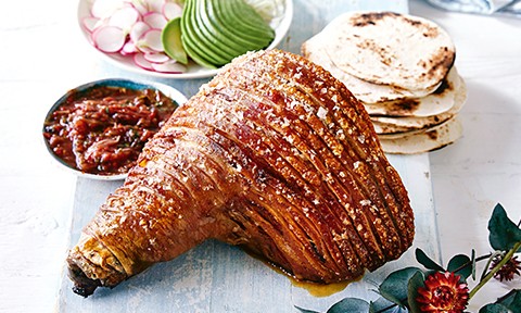 Curtis Stone’s Slow roasted pork leg with crackling and smoky salsa