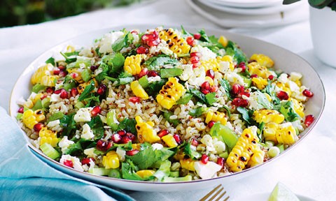 Brown rice salad with quinoa, corn and fetta mixture