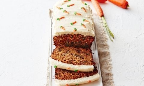 Sliced Carrot, Date and Walnut Loaf served on a plate