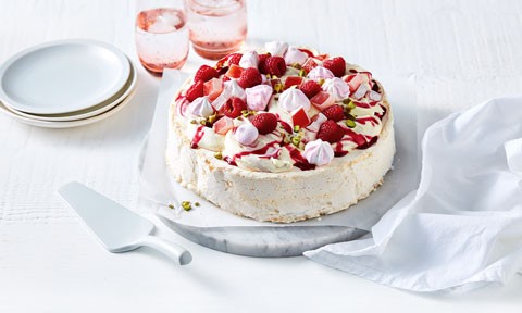 Raspberry rose pavlova topped with meringues and Turkish delight