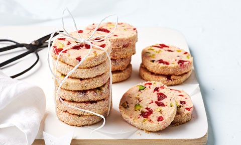 Almond and cherry biscuits stacked in ribbons