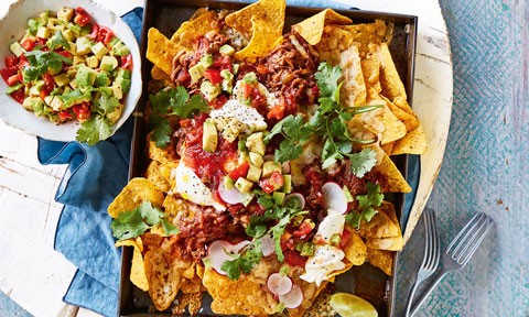 Pulled beef nachos served with salsa