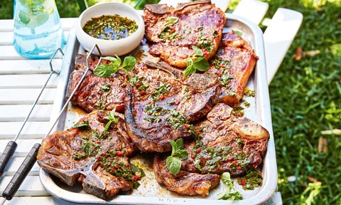 Six BBQ T-bone steak with chimichurri on a plate