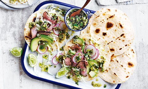 Curtis Stone's Steak tacos with spring onions and pepita salsa verde