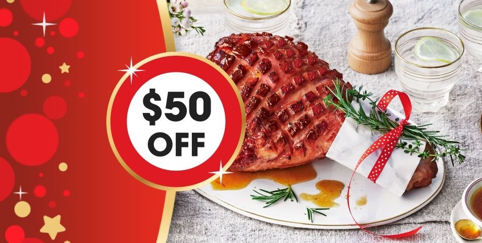 Christmas ham with a call out that says $50 off
