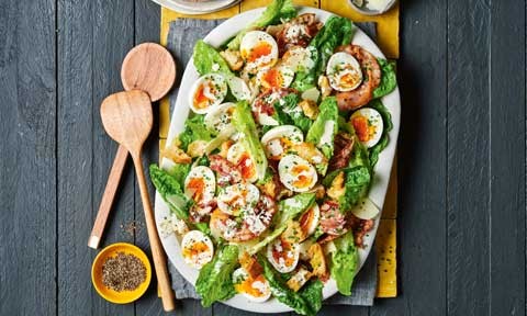 Caesar salad with soft-boiled eggs