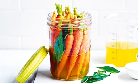 Curry spiced baby carrots in a jar