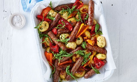 Sausage and Veggie Tray Bake in a tray on baking paper