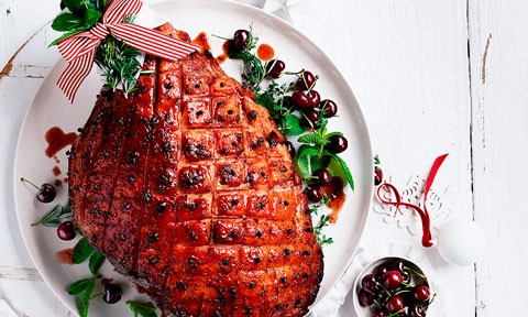 A roast ham with a cherry glaze