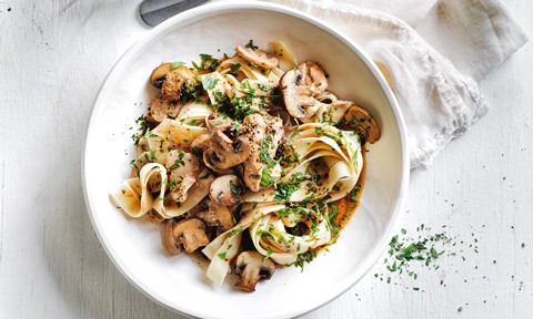Slow cooker chicken stroganoff sprinkled with parsely