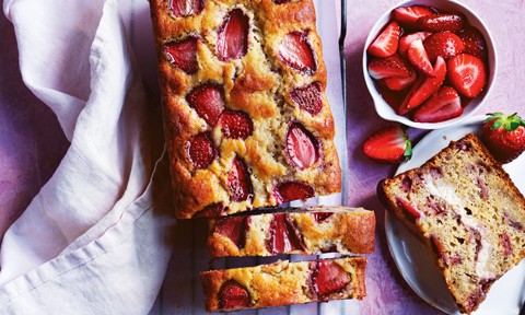 Strawberry cheesecake and banana bread served with extra strawberries