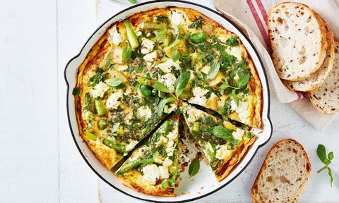 Spring vegetable frittata cut into wedges