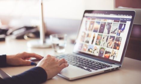 Woman using laptop to browse the internet