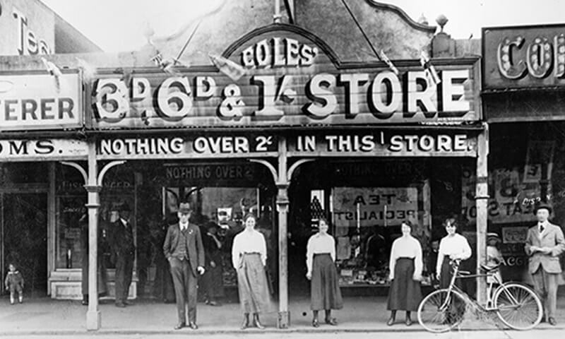 Vintage photo of Coles store front with people standing out the front