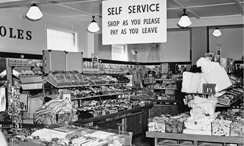 Black and white image of  the pantry asile of a Coles Supermarket 