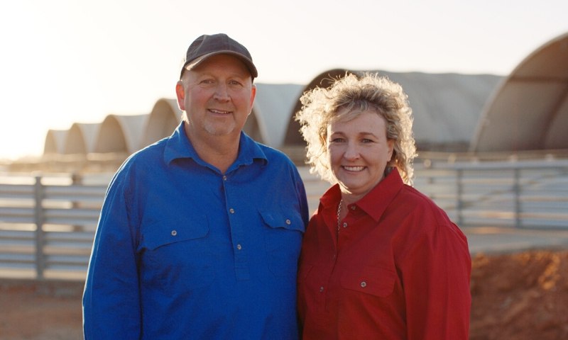 Edson piggery farmers smiling