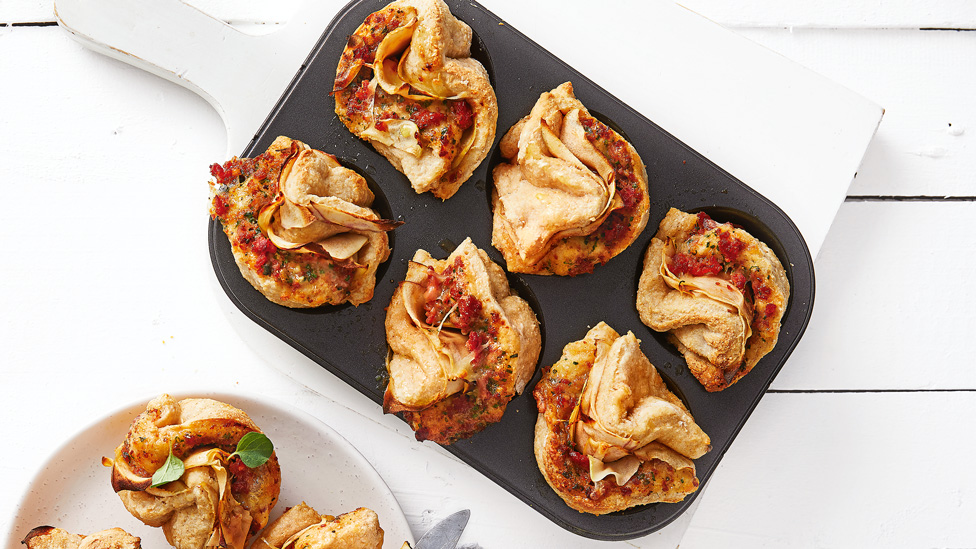 Apple and Blue Cheese Pull-apart Scones in muffin tray on white chopping board