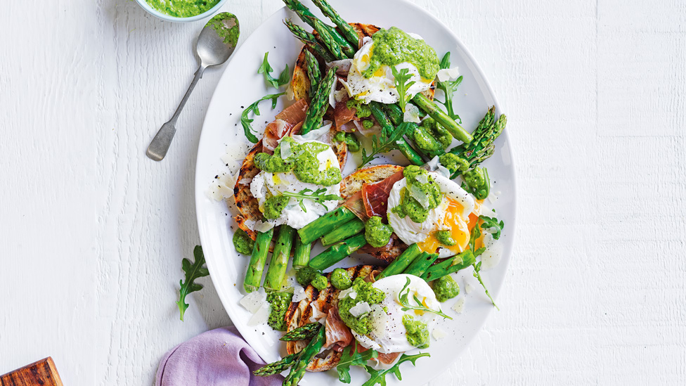 Asparagus wrapped in prosciutto with poached eggs