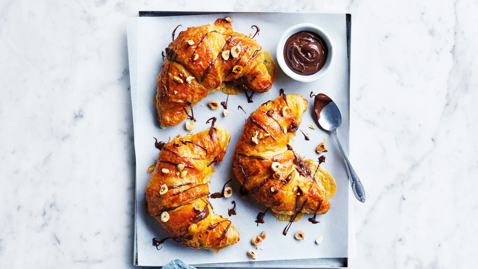 Three chocolate and orange croissant with almold and chocolate