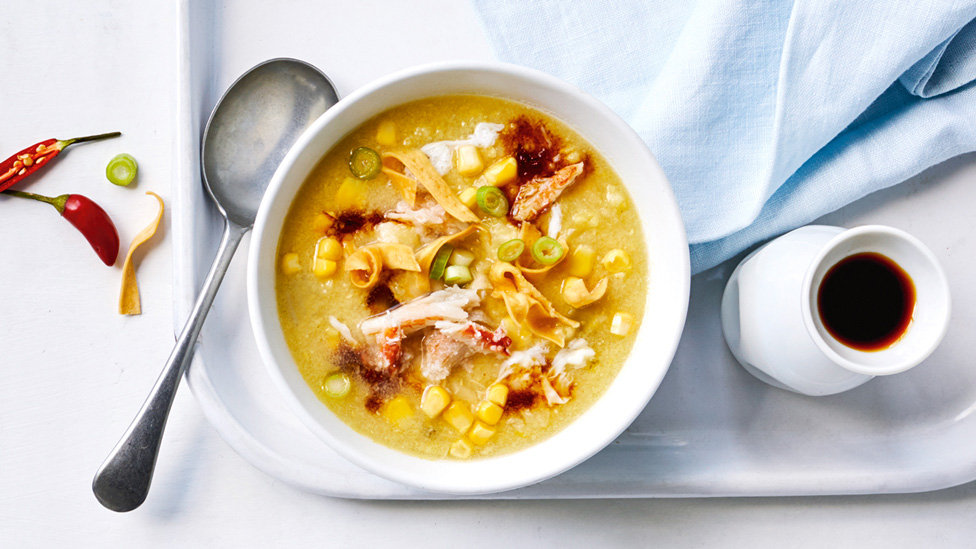 Chicken and corn soup with crab served with soy sauce mixture