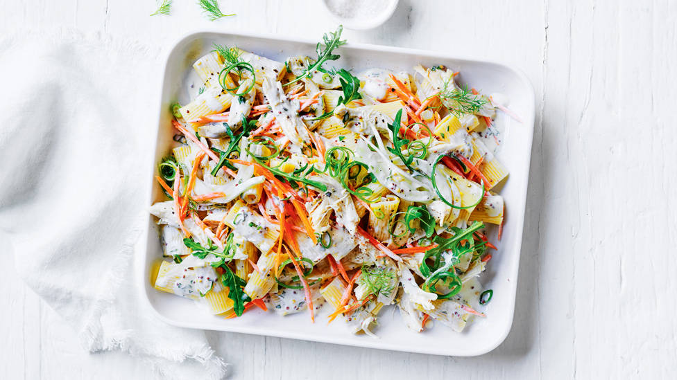 Chicken and fennel rigatoni salad mixture in a serving platter