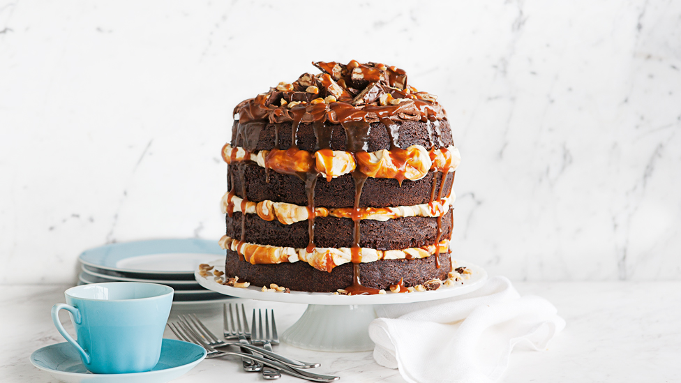 Chocolate snicker cake topped with addition snickers