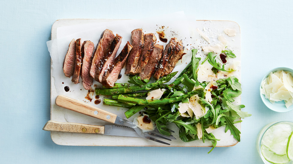 Curtis’ BBQ steak thickly sliced with asparagus and rocket