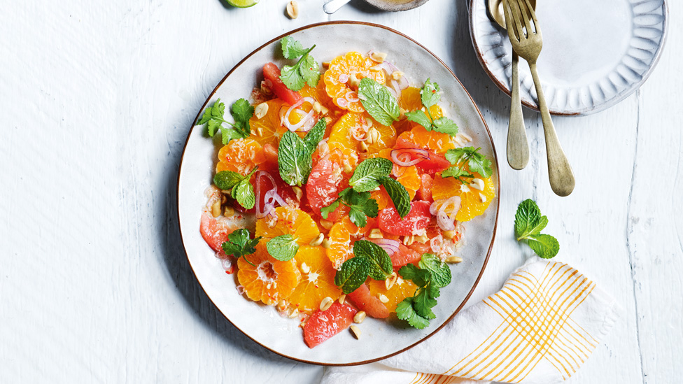 Thai style Citrus salad with lime and lemongrass vinaigrette and mint garnish