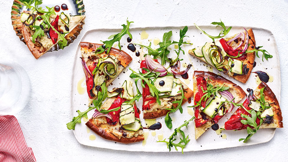Six pieces of gluten-free zucchini and cashew pizza
