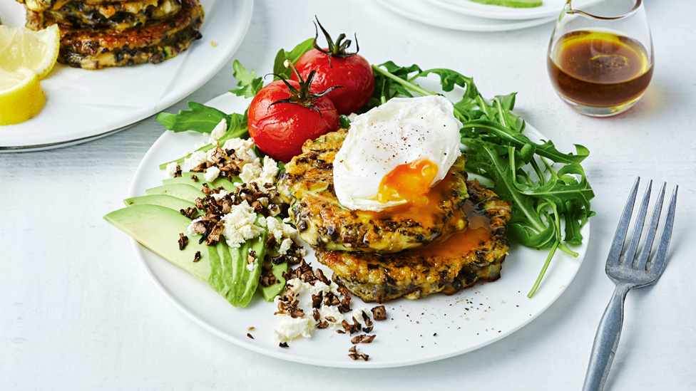 Two dishes of mushroom mince big breakfast with avocado salad