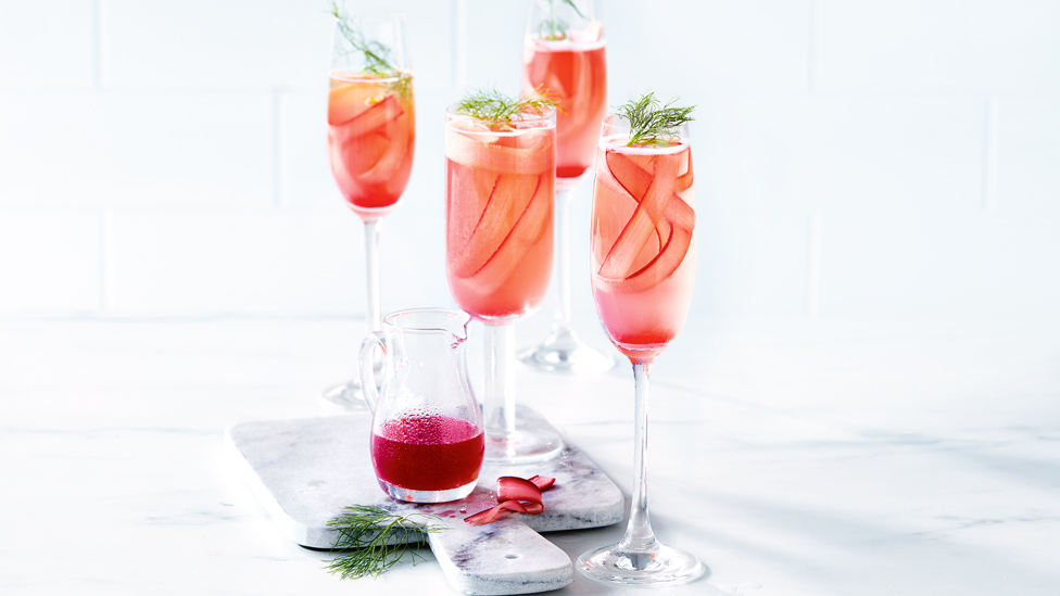 Four fresh rhubarb and fennel sparkling cocktails.