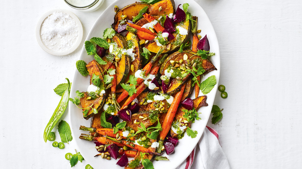 Spiced Pumpkin, Carrot and Beetroot with Green Chilli Yoghurt on White Serving Plate