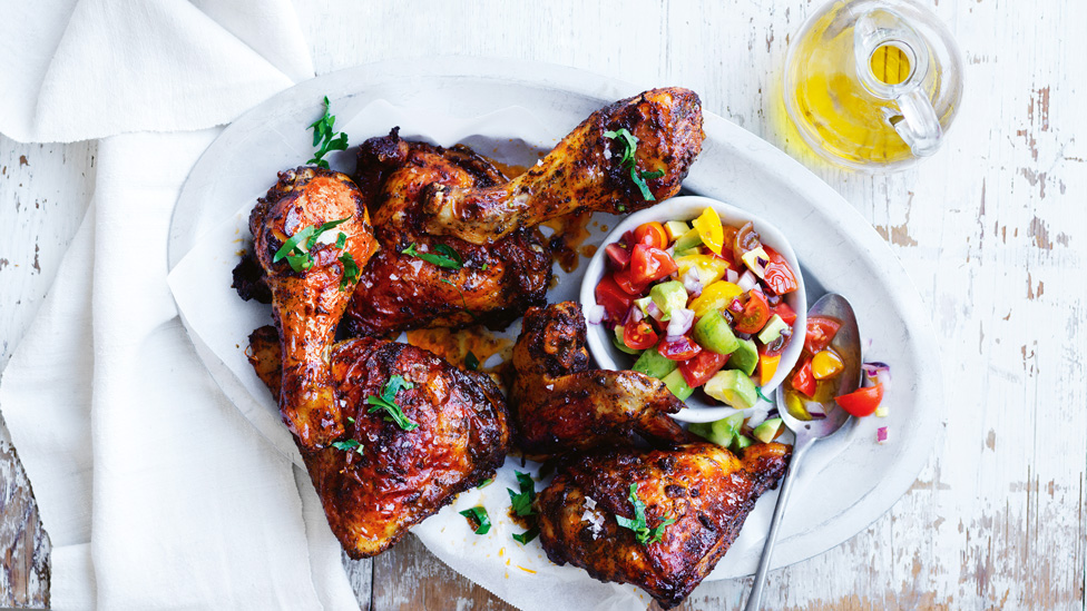 Sticky chicken portions with tomato and avocado salsa