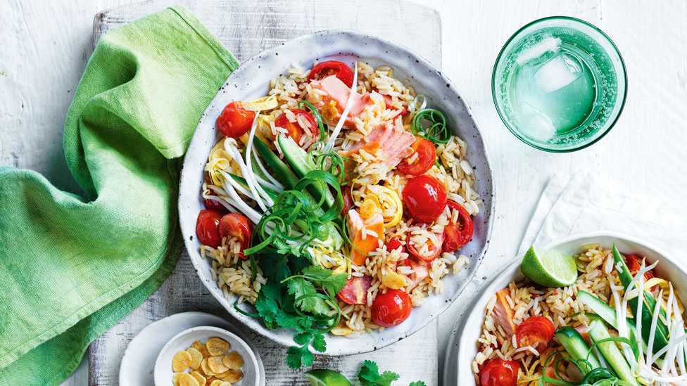 Fried rice with hot-smoked salmon and tomatoes