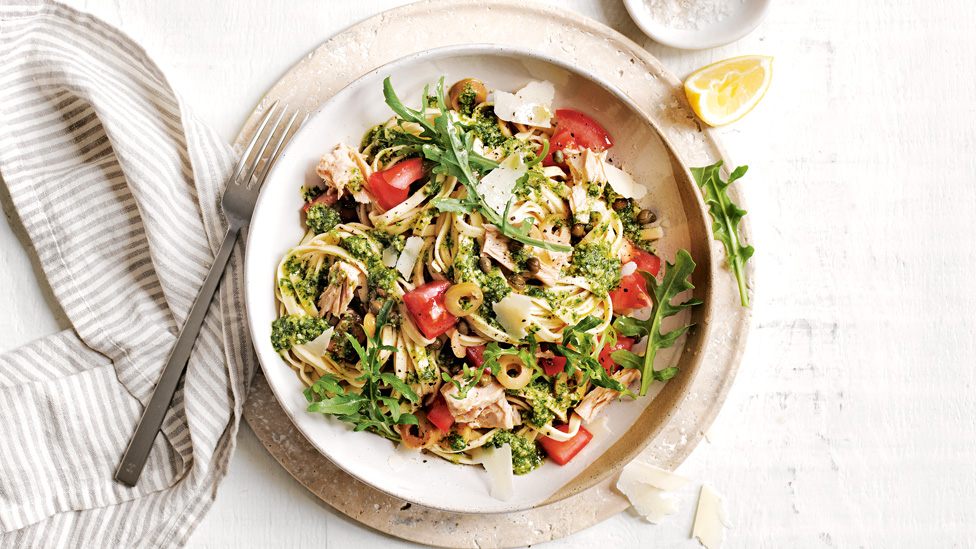 Tuna, capers and olive linguine served on a plate