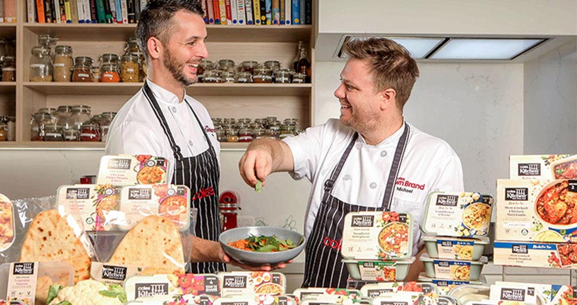 Michael Weldon in Coles kitchen with Coles Kitchen product range