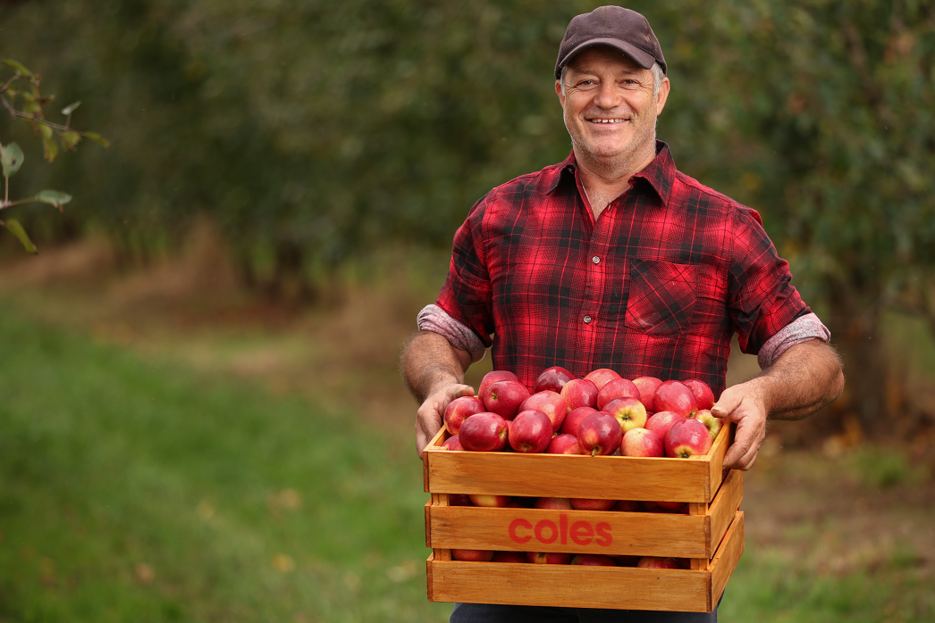 Apple grower with crate