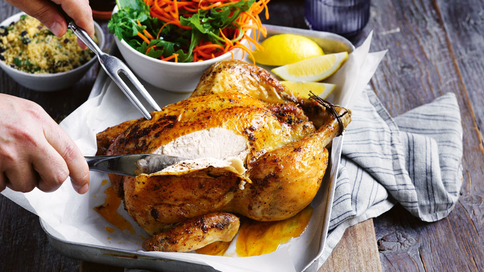 Harissa roast chicken with couscous stuffing 
