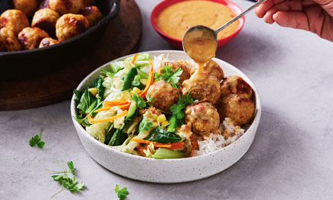 Chicken satay meatballs with veggies and rice