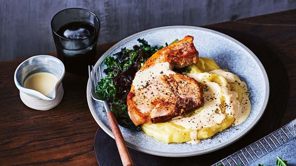Creamy mustard pork chops with kale 