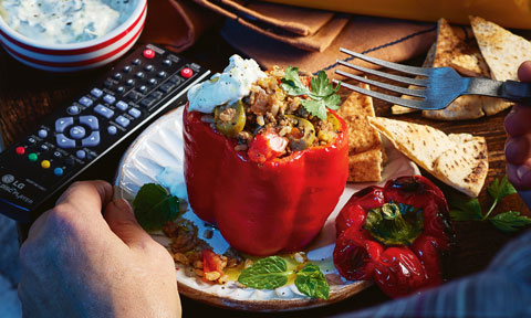 Capsicums stuffed full of lamb mince and rice with tomatoes, olives and herbs.