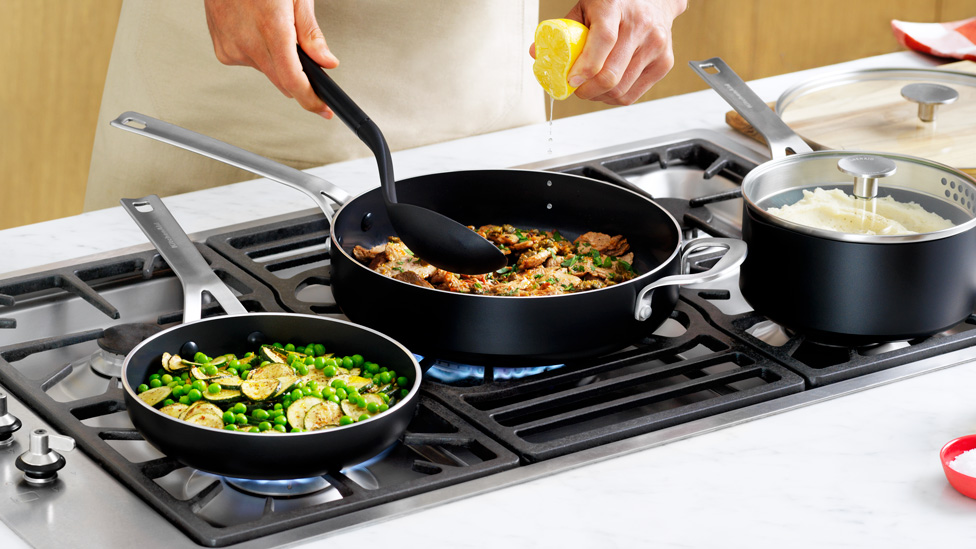 Pork Piccata with Potato Mash in frypan on serving board