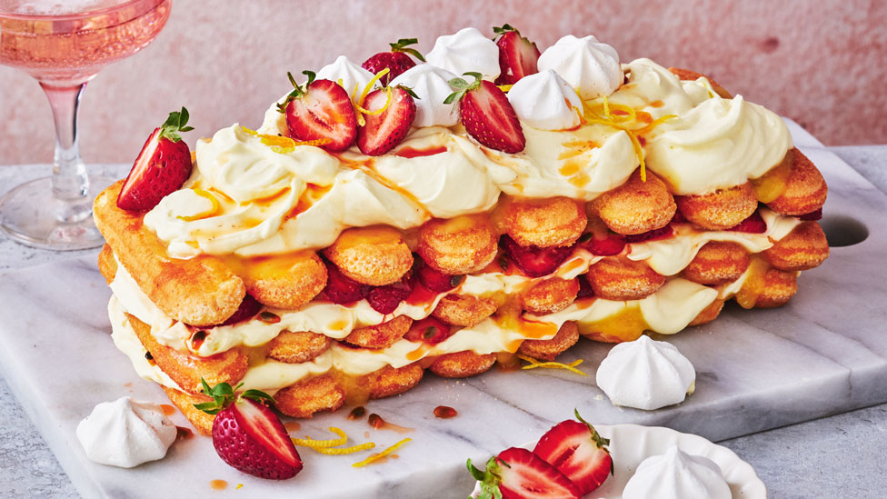 Lemon and strawberry sponge layer cake with cream layers