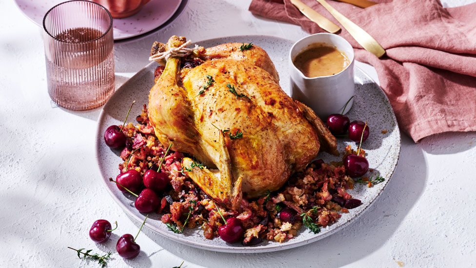 Roast chicken with cherry and prosciutto stuffing