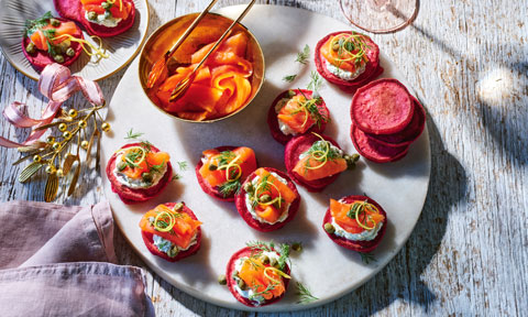 Beetroot blinis with smoked salmon and herb cream