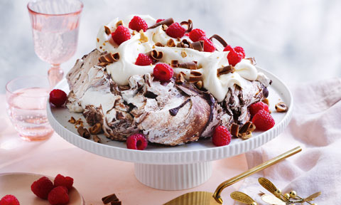 Chocolate swirl pavlova with raspberries and cream