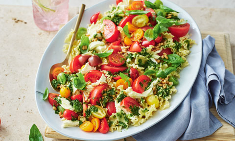 Mixed tomato pasta salad with pesto