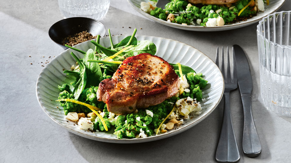 Pork steaks with smashed peas