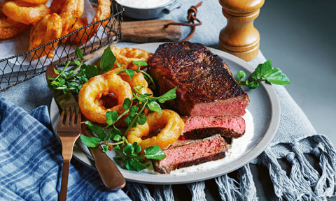 Curtis Stone’s pan-seared steak with beer-battered onion rings